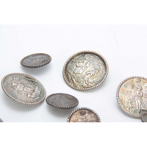 389 - A SET OF LATE 19th CENTURY SILVER BUTTONS having four large buttons, 34mm diameter, and twelve small... 