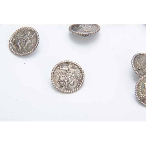 389 - A SET OF LATE 19th CENTURY SILVER BUTTONS having four large buttons, 34mm diameter, and twelve small... 