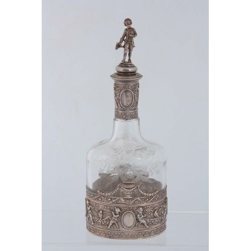 397 - A LATE 19th CENTURY CONTINENTAL SILVER AND ETCHED GLASS DECANTER WITH FIGURAL STOPPER of ovoid shape... 