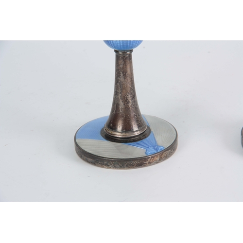 400 - A PAIR OF 1930'S ART DECO SILVER AND ENAMEL CANDLESTICKS having blue and grey engine-turned enamel, ... 