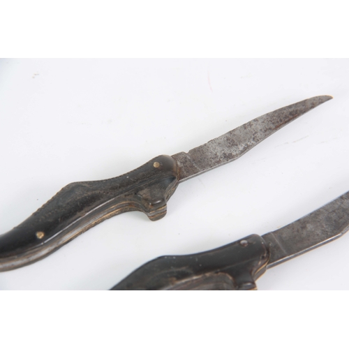 412 - A PAIR OF 19TH CENTURY PENKNIVES modelled as shoes (2)