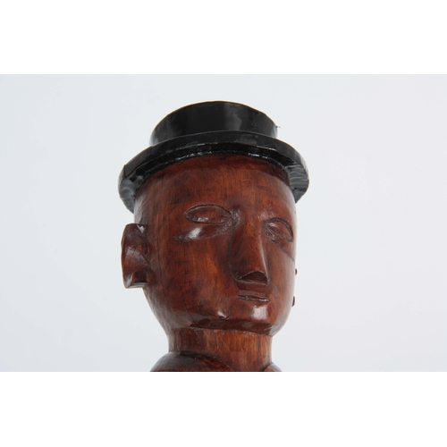 438 - A 19TH CENTURY FOLK ART  WALKING CANE carved with a man wearing a top hat 102cm overall.