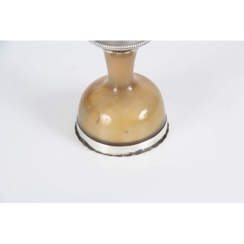 485 - AN 18th CENTURY SILVER MOUNTED CHALCEDONY STEM CUP of mushroom colour with light brown inclusions 6.... 