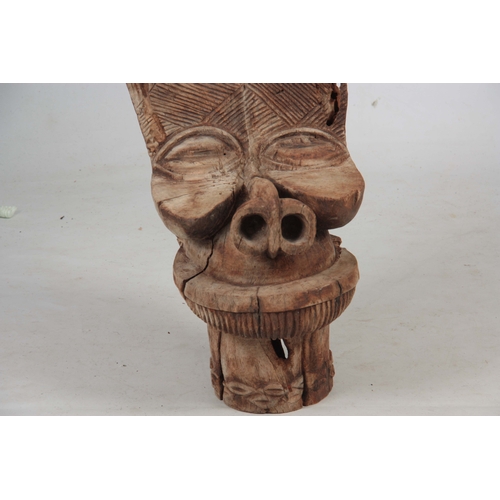 501 - A 20TH CENTURY BAMILEKE BATCHAM FACE CHAIR from Cameroon - 98cm high 38cm wide