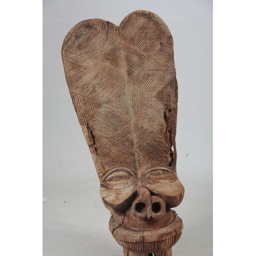 501 - A 20TH CENTURY BAMILEKE BATCHAM FACE CHAIR from Cameroon - 98cm high 38cm wide