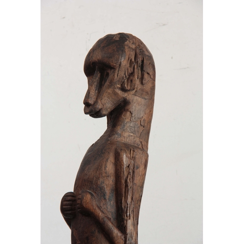 503 - AN ETHNIC AFRICAN TRIBAL MONKEY TOTEM POLE the totem carved out of a single piece of hardwood surmou... 