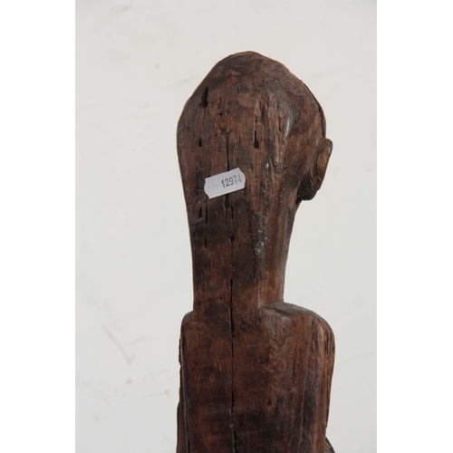 503 - AN ETHNIC AFRICAN TRIBAL MONKEY TOTEM POLE the totem carved out of a single piece of hardwood surmou... 