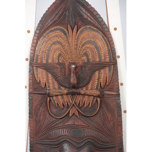 505 - A LARGE ETHNIC SEPIK RIVER TRIBAL MASK possibly from Papua New Guinea, the lower half depicting an a... 