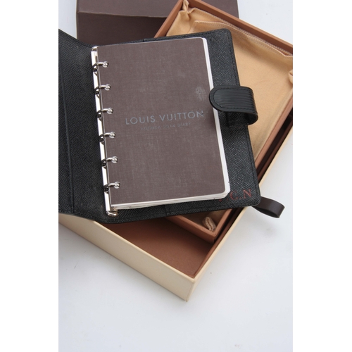 518 - A LOUIS VUITTON GRAINED BLACK LEATHER FOLDING DIARY for 2014 with sprung ring holders 14.5by18cm - w... 