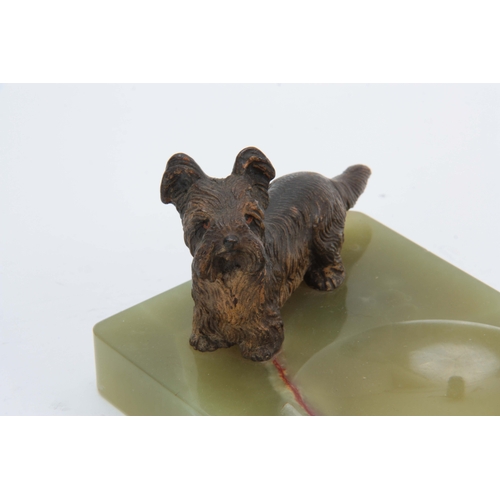 522 - AN EARLY 20th CENTURY AUSTRIAN COLD PAINTED BRONZE SCULPTURE modelled as a terrier mounted on onyx b... 