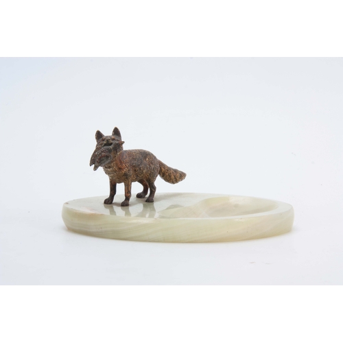 523 - AN EARLY 20th CENTURY AUSTRIAN COLD PAINTED BRONZE SCULPTURE modelled as a fox carrying a duck mount... 