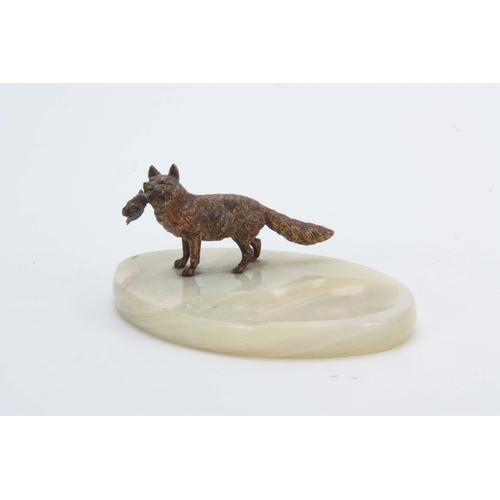 523 - AN EARLY 20th CENTURY AUSTRIAN COLD PAINTED BRONZE SCULPTURE modelled as a fox carrying a duck mount... 