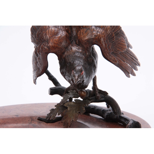 531 - AN EARLY 20th CENTURY AUSTRIAN COLD PAINTED BRONZE AND MARBLE DESK TIDY modelled as a capercaillie p... 