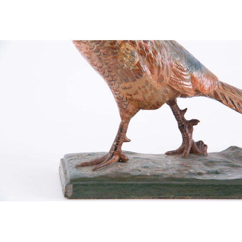 542 - A LATE 19th CENTURY PAINTED METAL SCULPTURE modelled as a pheasant 30.5cm wide