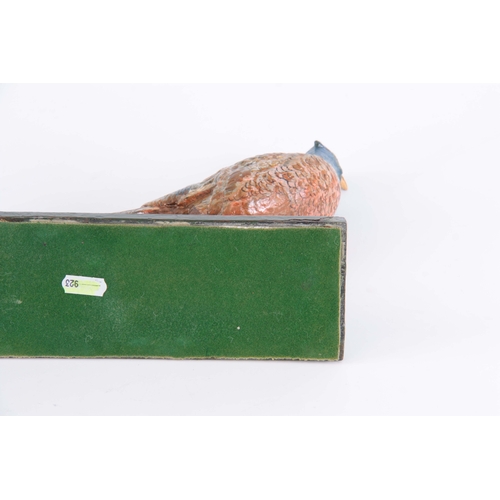 542 - A LATE 19th CENTURY PAINTED METAL SCULPTURE modelled as a pheasant 30.5cm wide