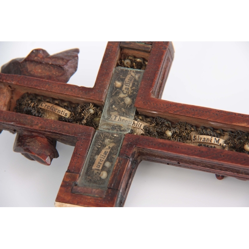 547 - A 16TH/17TH CENTURY ITALIAN FINELY CARVED WALNUT RELIQUARY CROSS WITH BONE TIPPED EDGES the high rel... 