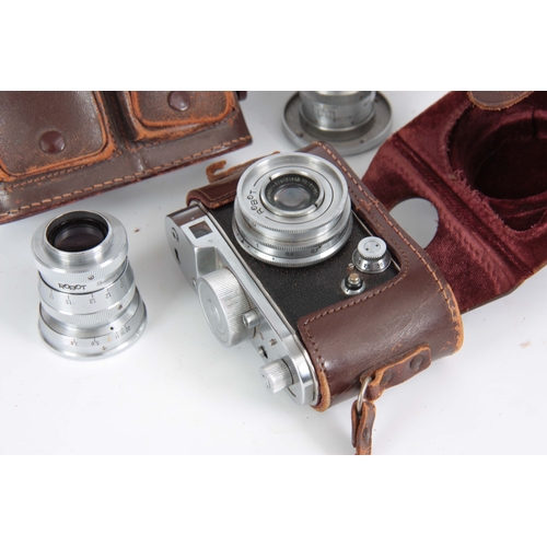 553 - A GERMAN BERNING ROBOT CAMERA with Robot Carl Zeiss lens in leather case and a Schneider Xenar lens.... 