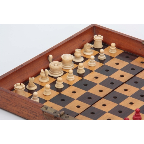 562 - A LATE 19th CENTURY JAQUES, LONDON TRAVELLING 'IN STATU QUO' TRAVELLING CHESS SET the folding mahoga... 