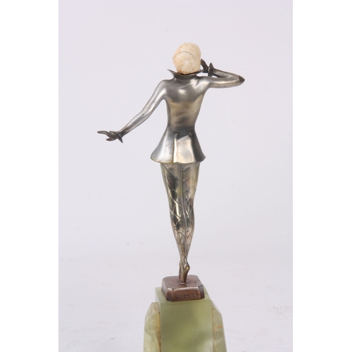 576 - JOSEF LORENZL. AN ART DECO COLD-PAINTED SILVERED-BRONZE AND IVORY SCULPTURE formed as a dancer with ... 