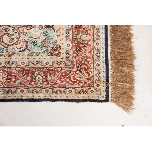 587 - A SILK TURKISH RUG 150cm wide 94cm deep