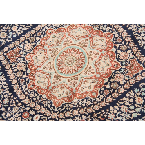 587 - A SILK TURKISH RUG 150cm wide 94cm deep