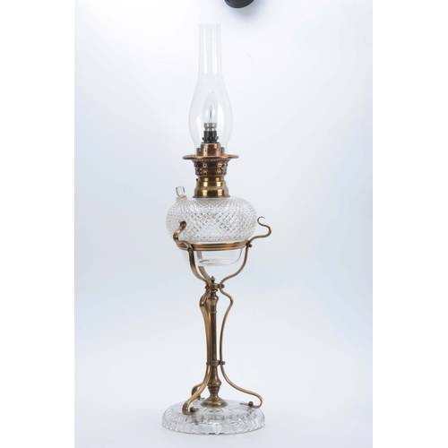 596 - AN ART NOUVEAU BRASS AND CUT GLASS OIL LAMP having unusual hobnail cut vessel with refill plug mount... 