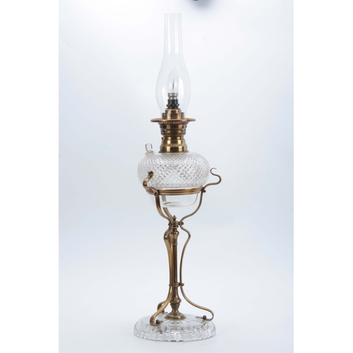 596 - AN ART NOUVEAU BRASS AND CUT GLASS OIL LAMP having unusual hobnail cut vessel with refill plug mount... 