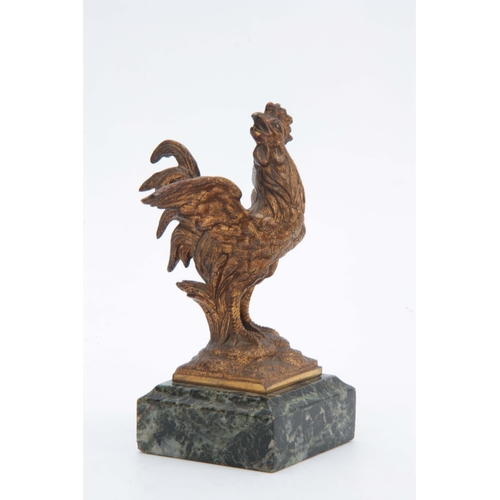 600 - A LATE 19th CENTURY GILT BRONZE SCULPTURE modelled as a cockerel mounted on green marble base 16cm h... 