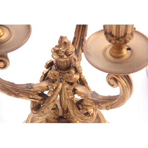 601 - A PAIR OF 19TH CENTURY FRENCH ORMOLU AND MARBLE THREE BRANCH CANDELABRA with triple urn-shaped sconc... 