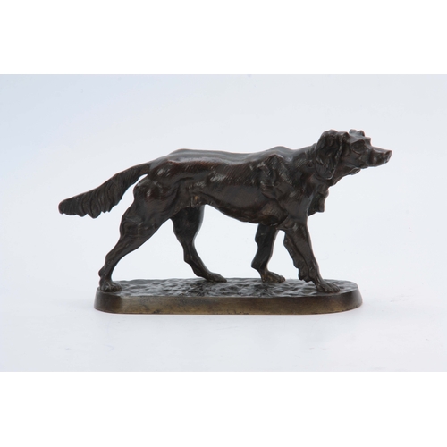 605 - A LATE 19th CENTURY PATINATED BRONZE SCULPTURE modelled as a standing gun dog on naturalistic base 1... 