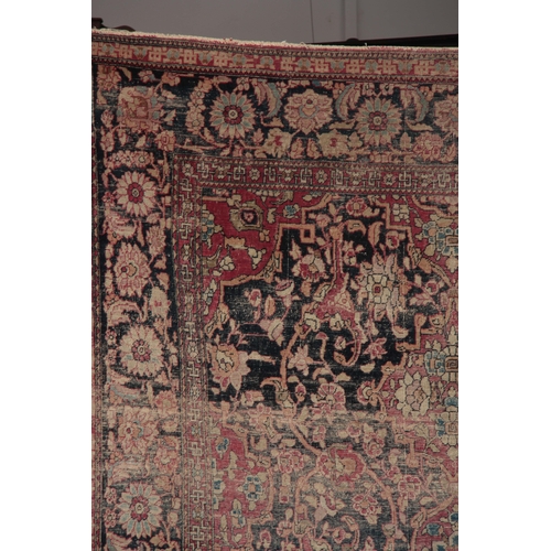 607 - A MULTI-COLOURED 19TH CENTURY PERSIAN RUG with floral border and medallion centre 218 long, 134cm wi... 