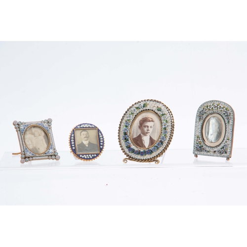 610 - A SET OF FOUR LATE 19TH CENTURY MICRO MOSAIC PICTURE FRAMES decorated with flowers 8cm high and smal... 