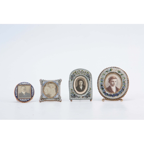 610 - A SET OF FOUR LATE 19TH CENTURY MICRO MOSAIC PICTURE FRAMES decorated with flowers 8cm high and smal... 