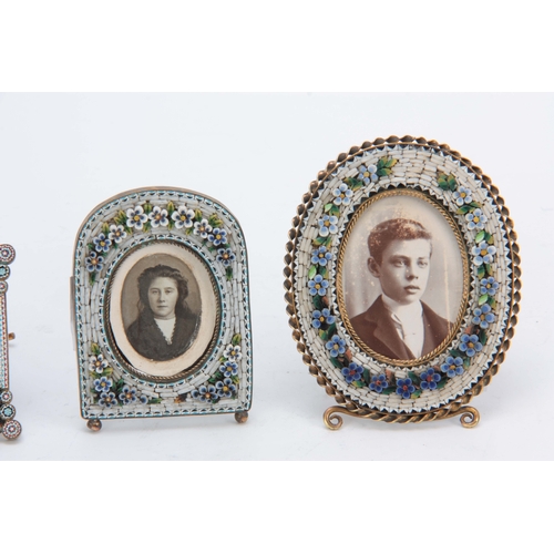 610 - A SET OF FOUR LATE 19TH CENTURY MICRO MOSAIC PICTURE FRAMES decorated with flowers 8cm high and smal... 