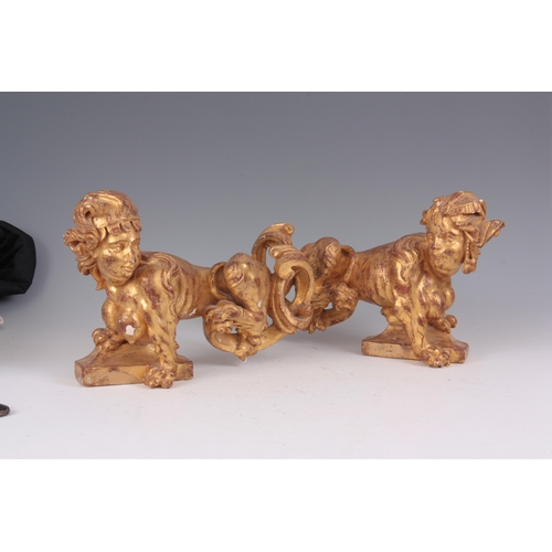 616 - A PAIR OF 18TH CENTURY GILT GESSO PLASTERWORK CHIMERA STATUES 40cm wide 28cm high.