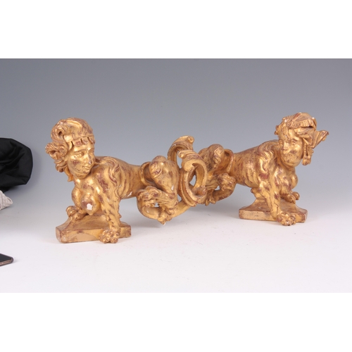 616 - A PAIR OF 18TH CENTURY GILT GESSO PLASTERWORK CHIMERA STATUES 40cm wide 28cm high.