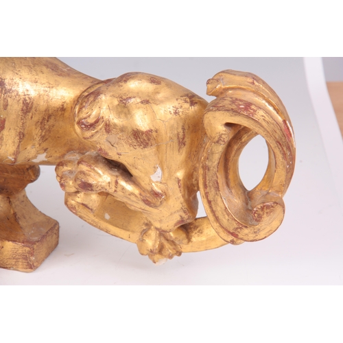 616 - A PAIR OF 18TH CENTURY GILT GESSO PLASTERWORK CHIMERA STATUES 40cm wide 28cm high.