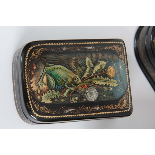 617 - A COLLECTION OF 3 FINELY PAINTED EARLY 20TH CENTURY RUSSIAN LACQUERED JEWELLERY BOXES, one of frog a... 