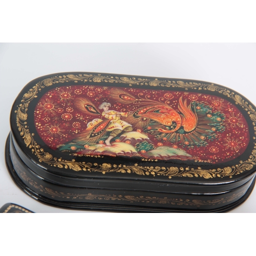 617 - A COLLECTION OF 3 FINELY PAINTED EARLY 20TH CENTURY RUSSIAN LACQUERED JEWELLERY BOXES, one of frog a... 