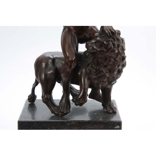 621 - A LARGE 19th CENTURY PATINATED BRONZE SCULPTURE modelled as Samson slaying the Lion stood on black m... 