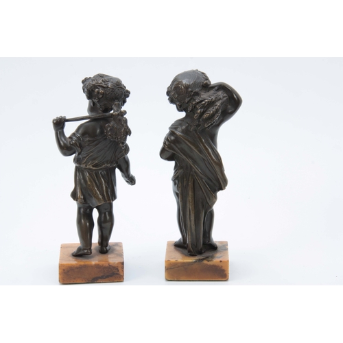 640 - A PAIR OF 19th CENTURY PATINATED BRONZE SCULPTURES modelled as putti harvesters mounted on Sienna ma... 