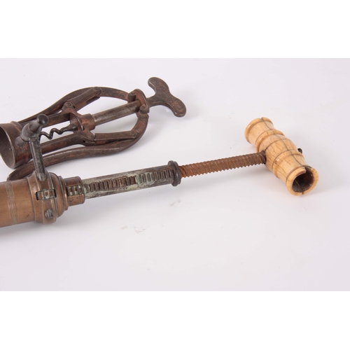 648 - A 19th CENTURY DOWLER PATENT CORKSCREW with bone handle, together with a James Heeler Patent corkscr... 