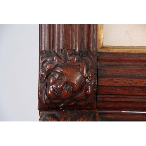 661 - THOMAS WILKINSON WALLIS. A PAIR OF LATE 19th CENTURY GOTHIC REVIVAL CARVED OAK PICTURE FRAMES of mou... 