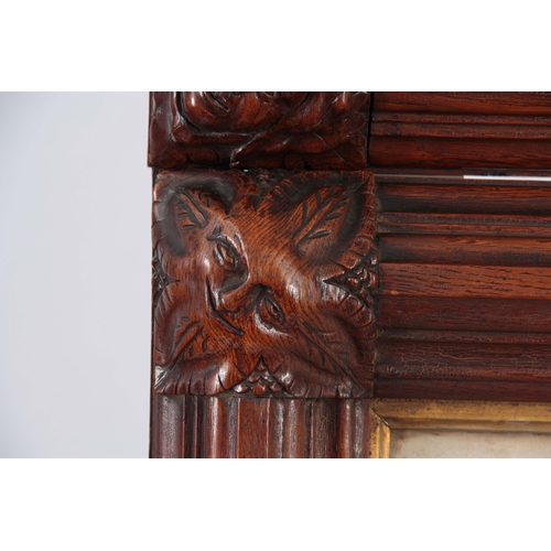 661 - THOMAS WILKINSON WALLIS. A PAIR OF LATE 19th CENTURY GOTHIC REVIVAL CARVED OAK PICTURE FRAMES of mou... 