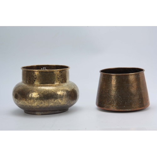 663 - TWO 19TH CENTURY ISLAMIC BRASS JARDINIERS the larger with a bulbous engraved body with matching, pie... 