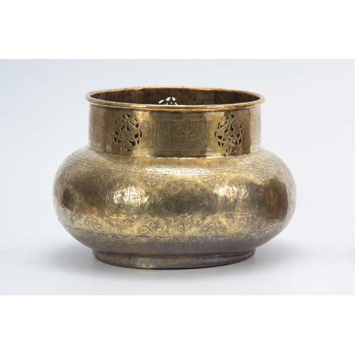 663 - TWO 19TH CENTURY ISLAMIC BRASS JARDINIERS the larger with a bulbous engraved body with matching, pie... 