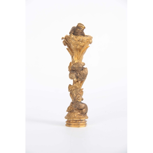 670 - A 19th CENTURY ORMOLU SEAL modelled as two birds nesting with a rat at the base 11cm high