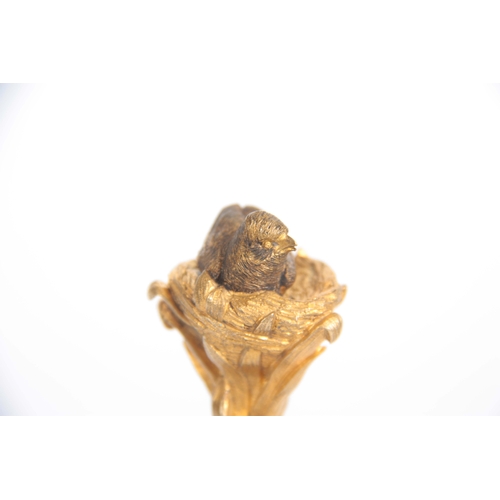 670 - A 19th CENTURY ORMOLU SEAL modelled as two birds nesting with a rat at the base 11cm high