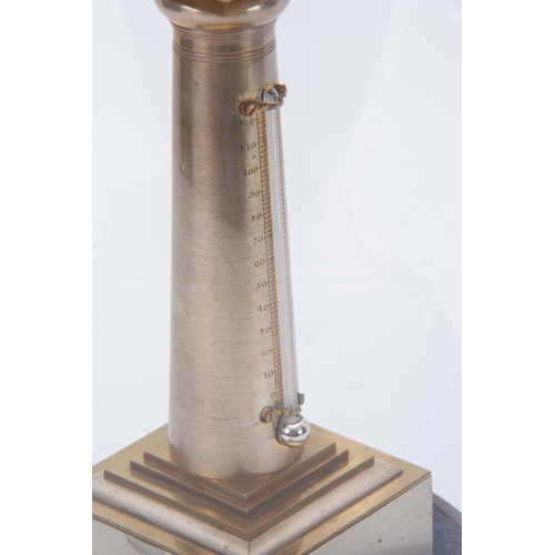 677 - A LATE 19th CENTURY SILVERED AND GILT BRONZE THERMOMETER UNDER DOME the tapered pillar surmounted by... 