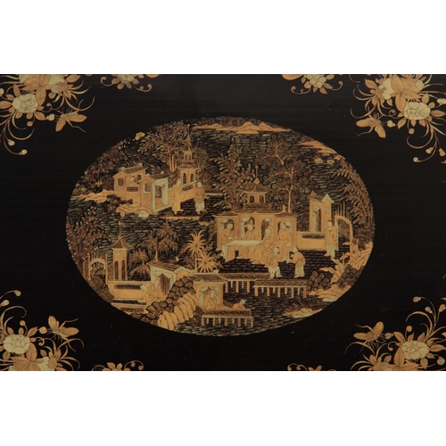 680 - A 19TH CENTURY SCALLOPED BLACK LACQUER AND CHINOISERIE DECORATED PAPIER MACHE TRAY with central dome... 